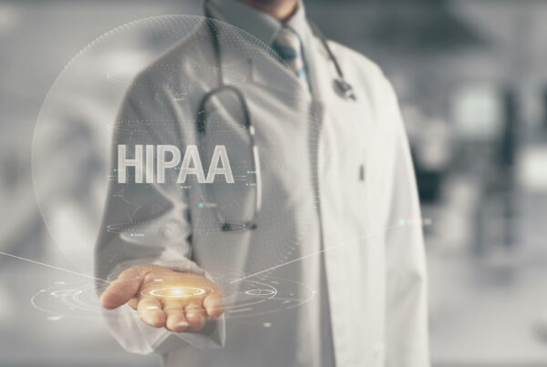 Doctor holding in hand HIPAA