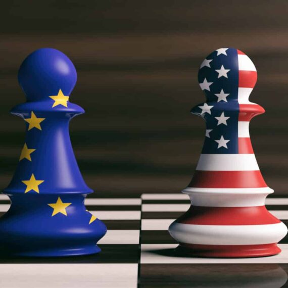 USA and European Union flags on chess pawns on a chessboard. 3d
