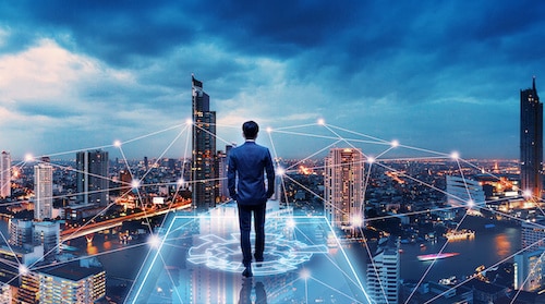 Business man on future network city|