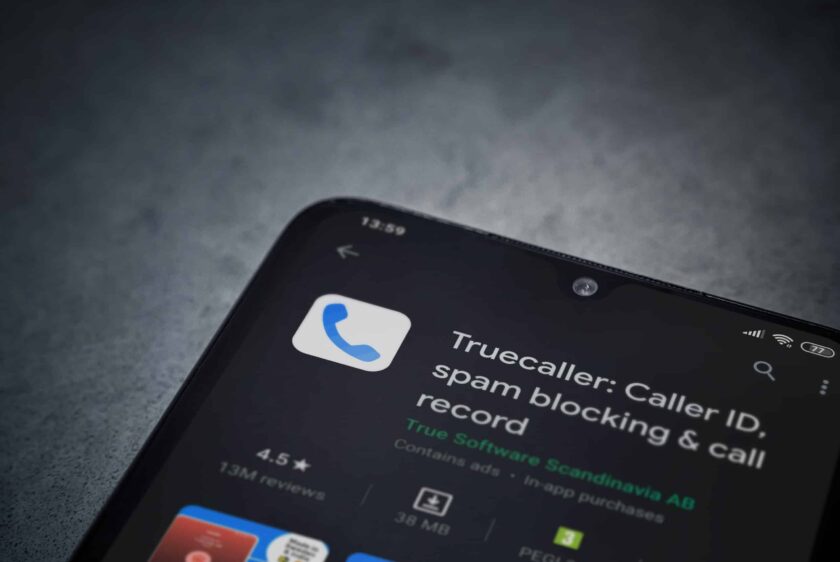 Truecaller app play store page on the display of a black mobile